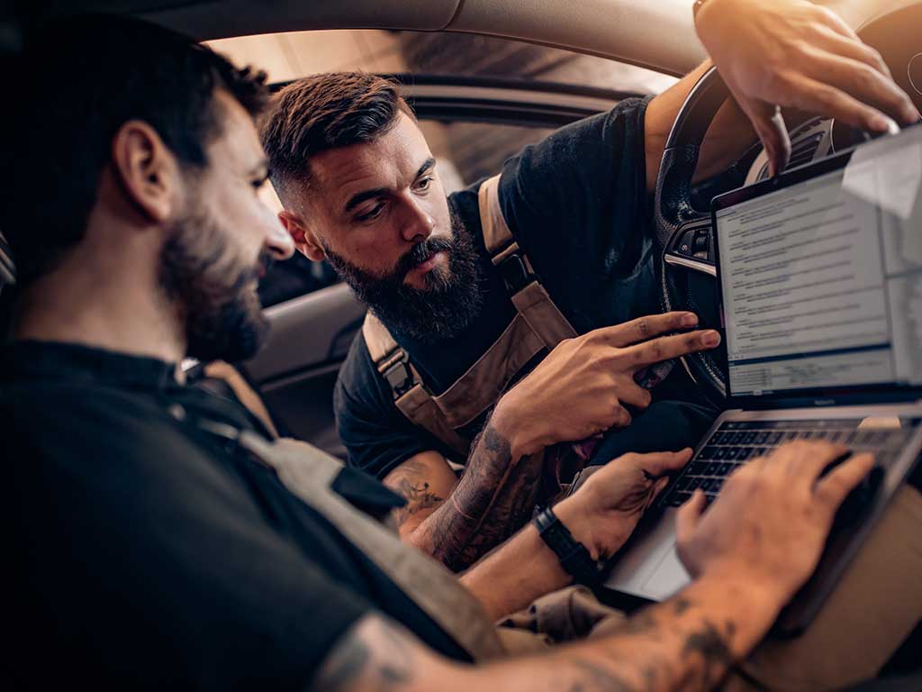 Apollo Autobody | Techs selecting parts